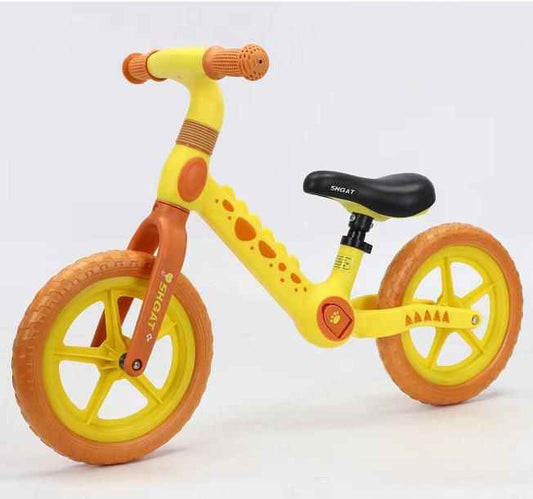 Bicicleta de impulso estilo dinosaurio amarilla para niños y niñas