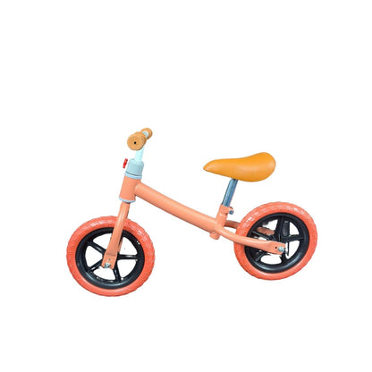 Bicicleta de impulso naranja para niños, paseo y recreación